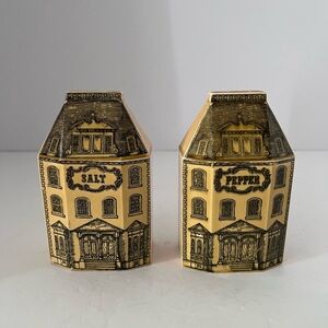 This is a vintage Regency Row Dutch English Houses salt and pepper shaker set.